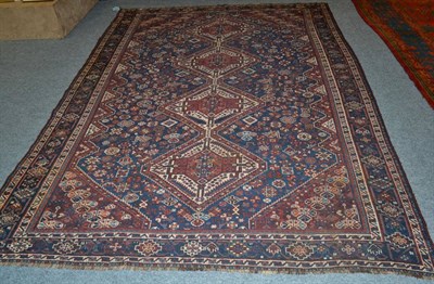 Lot 1305 - Khamseh carpet, South West Iran, the deep indigo field of zoomorphic and tribal devices around four