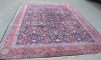 Lot 1312 - Bidjar carpet, Iranian Kurdistan, the deep indigo field with an allover floral lattice design...