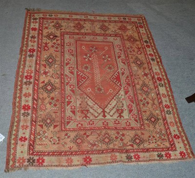 Lot 1313 - Melas Prayer rug, West Anatolia, the coral pink field with flower Tree of Life beneath the...