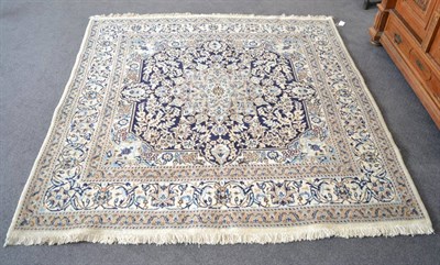 Lot 1326 - Nain rug of unusual size, Central Iran, the indigo field centred by a flowerhead medallion...