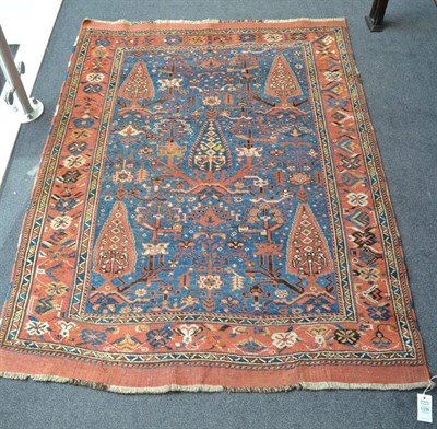 Lot 1336 - ^ Afshar rug, South East Iran, the pale indigo field of angular vines and trees enclosed by...