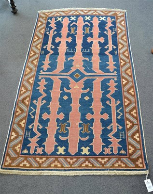 Lot 1337 - ^ Derbend rug, South East Caucasus, circa 1900, the abrashed indigo field with columns of...