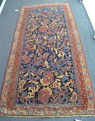 Lot 1338 - Bidjar rug, Iranian Kurdistan, the midnight blue field of semi-naturalistic vines enclosed by ivory