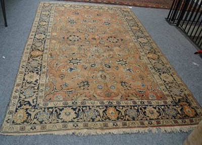 Lot 1352 - Tabriz carpet, Iranian Azerbaijan, the rust field with an allover design of palmettes and...