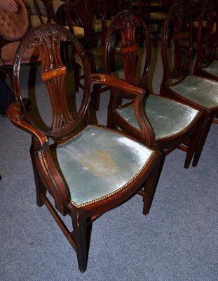 Lot 1391 - A set of eight Edwardian mahogany and satinwood dining chairs upholstered in close nailed...