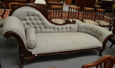 Lot 1395 - A Victorian style mahogany framed chaise longue upholstered in button back fabric, 220cm wide