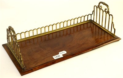 Lot 1426 - A 19th century mahogany and brass bound book trough, 46cm wide