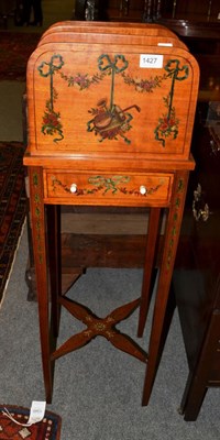 Lot 1427 - An Edwardian painted satinwood magazine stand fitted with a drawer, 99cm high