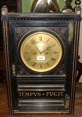 Lot 1429 - An Arts and Crafts ebonised striking shelf clock, signed Kleyser & Co, 69 Boro, High St, case front