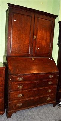 Lot 1445 - ^ A 19th century oak bureau bookcase, 118cm wide