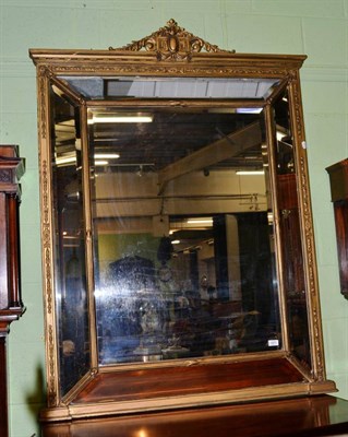 Lot 1471 - A 19th century large gilt wood and gesso wall mirror, the central plate bordered by margin...