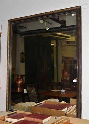 Lot 1505 - A late 19th/early 20th century ebonised and parcel gilt rectangular wall mirror, 136cm high