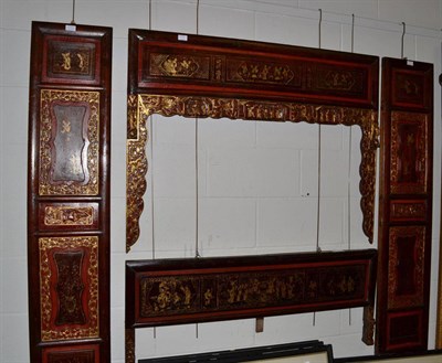 Lot 1522 - A 19th century Chinese parcel gilt bed frame, 118cm wide with two matching decorative panels, 148cm