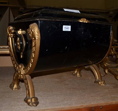 Lot 1540 - A Regency style black and gilt painted coal box, with hinged lid fitted with a pair of tongs,...