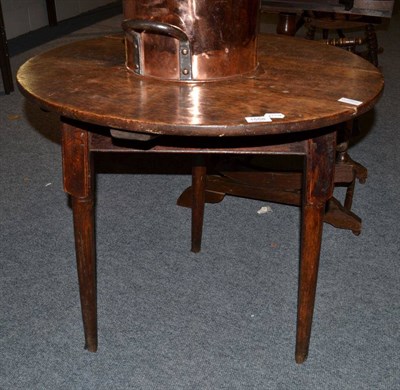 Lot 1558 - An 18th century joined oak cricket table of circular form, 73cm diameter by 70cm high