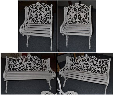 Lot 1567 - An aluminium white painted Victorian style garden set comprising; two benches with wooden...