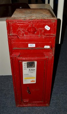 Lot 1571 - A red painted postbox with key, height 72cm