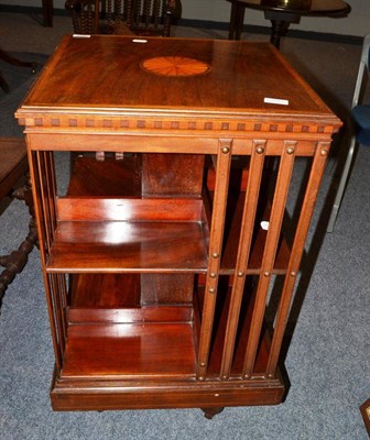 Lot 1574 - # An Edwardian mahogany and satinwood banded revolving bookcase, inlaid with shell patra,...