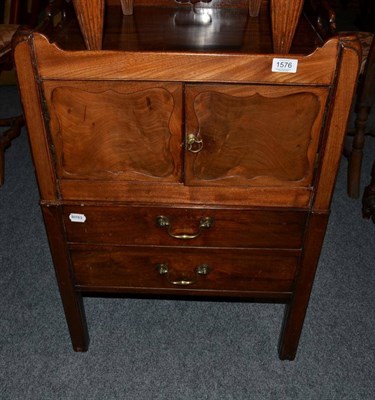 Lot 1576 - A George III mahogany night table, galleried top, above cupboard and sliding base, 78cm high by...