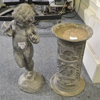 Lot 1592 - A lead garden figure modelled as a nude boy, 52cm high together with a lead column support...