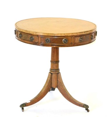 Lot 1602 - A mahogany and leather top drum table, early 20th century, in George III style, with four real...