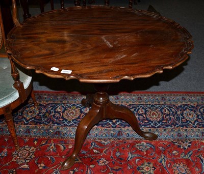 Lot 1603 - An 18th century style mahogany snaptop piecrust pedestal table on pad feet, 91cm diameter, 72cm...