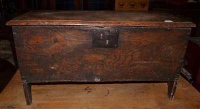 Lot 1611 - {} An 18th century elm sword chest, 84cm wide (repairs)