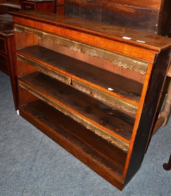 Lot 1618 - # A late 19th/early 20th century oak open bookcase, with green and gilt tooled leather draped...