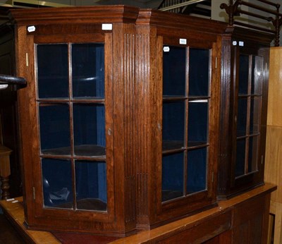 Lot 1622 - ~ A pair of mahogany hanging corner cupboards, 53cm wide and a similar example 50cm wide