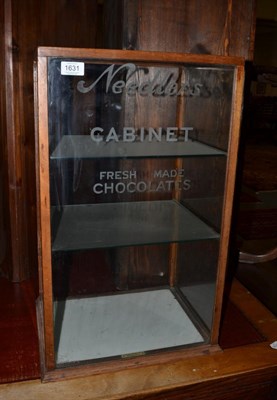 Lot 1631 - An early 20th century oak frame shop counter, labelled 'Needler's cabinet fresh made...