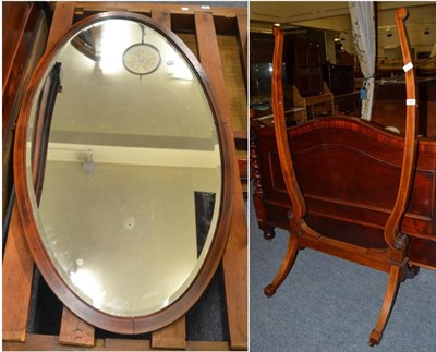 Lot 1655 - An Edwardian mahogany and boxwood strung cheval mirror, the oval bevel glass plate with four...