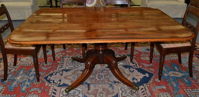 Lot 1664 - A 19th century mahogany pedestal dining table, tilt top, rectangular form, diameter 167cm