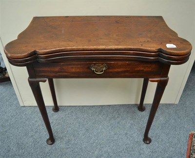 Lot 1666 - A George III double mahogany fold over tea/card table with dual fold out section and fitted one...