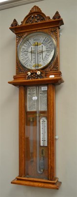 Lot 1670 - An oak Admiral Fitzroy Improved Torricelli barometer, retailed by F.H.Cousens, Hull, circa...