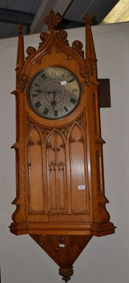 Lot 1671 - An oak striking drop dial wall clock, signed W Davis & Sons, Birmingham, circa 1870, Gothic...