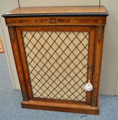 Lot 1674 - A Victorian walnut and brass grill door pier cabinet, 80cm wide