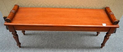 Lot 1675 - A Victorian style mahogany window seat with scrolled ends, 122cm wide