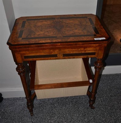 Lot 1722 - A Victorian walnut and ebonised games/sewing table, 61cm wide