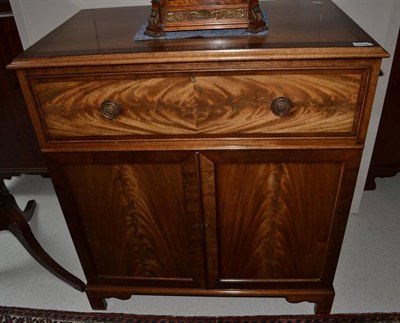 Lot 1727 - ~ A reproduction secretaire cabinet in the Regency style stamped 'Gotts, Pickering' 81cm wide