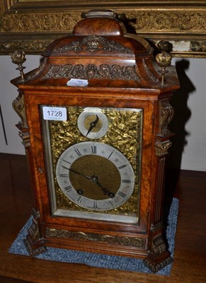 Lot 1728 - A walnut quarter striking table clock, circa 1900, inverted pediment with carrying handle, gilt...