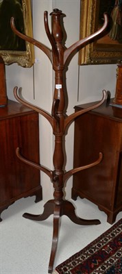 Lot 1729 - A George III mahogany nine branch hatstand, 154cm height