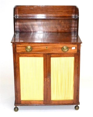 Lot 1739 - A George III secretaire cabinet in the manner of Gillows, 66cm wide