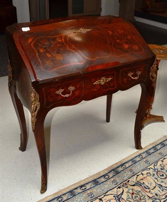 Lot 1751 - A Louis XV style rosewood and marquetry inlaid bureau, early 20th century, the fall enclosing...