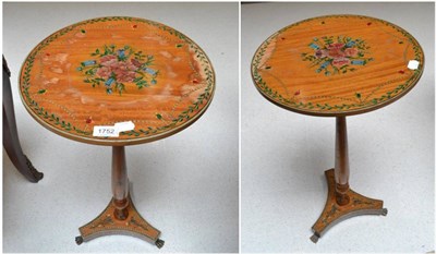 Lot 1752 - Two Edwardian satinwood and polychrome decorated pedestal wine tables, diameter 36cm