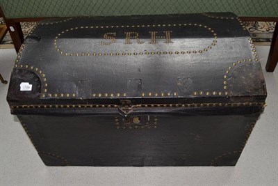 Lot 1755 - A domed trunk covered in black close nailed leather, stamped 'SRH', 85cm wide