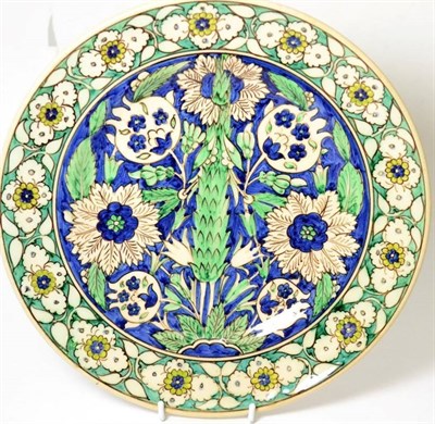 Lot 7 - A Cantagalli majolica plate painted Isnik style with pomegranates and flowers with foliage...