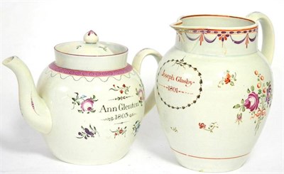Lot 16 - A dated pearlware jug of ovoid form inscribed JOSEPH GLASBY 1801, painted with flower sprays...