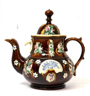 Lot 34 - A Measham barge ware teapot and cover, dated 1879 of typical form, inscribed J & K CLARK,...