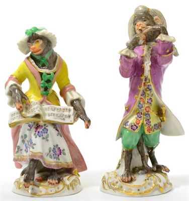 Lot 47 - A pair of Meissen porcelain monkey band figures, circa 1900, as a singer and woodwind player,...