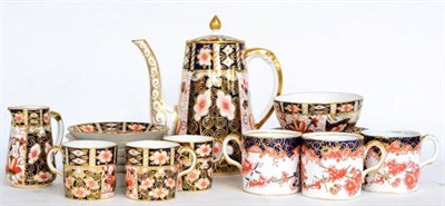 Lot 68 - ^ A Royal Crown Derby Imari pattern coffee pot and cover, 1929, of conical form, with printed...
